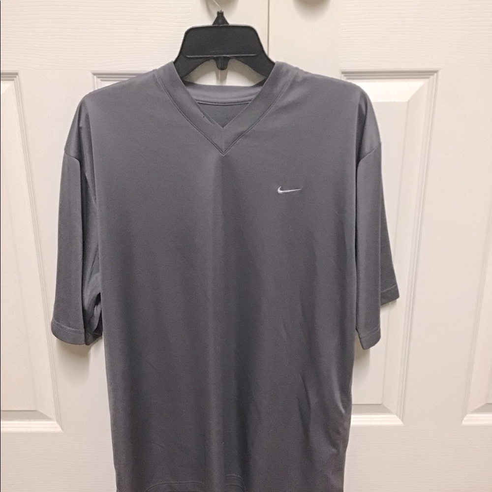 Nike V neck style athletic shirt